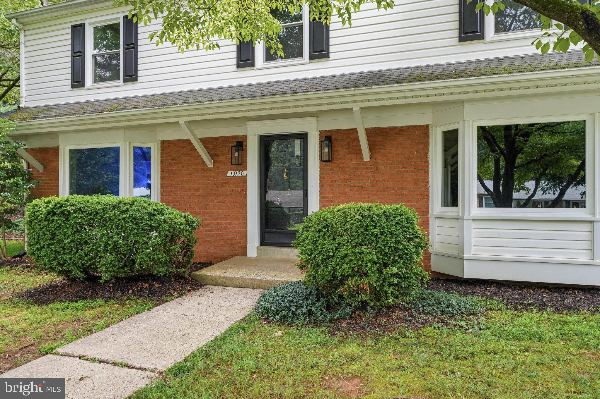 13120 Clifton Road Silver Spring, MD 20904 - Photo 48 of 69 a front view of a house with garden