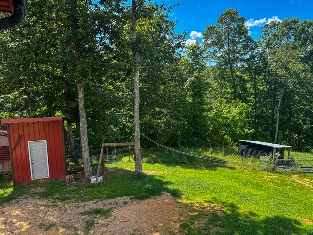a backyard of a house with seating space