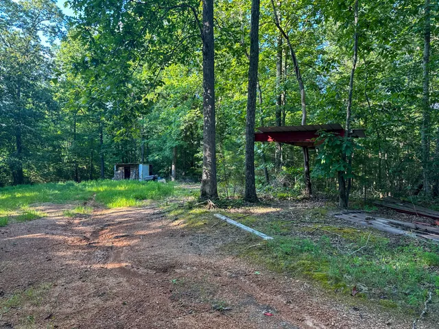 a backyard of a house with seating space