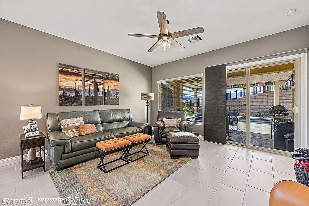 1304 Cottage Ridge Mesquite, NV 89034 - Photo 15 of 52 The living area offers generous proportions and bright lighting with a view of the outdoors.