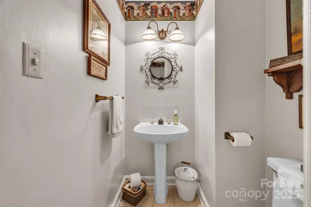 a bathroom with a toilet and a sink