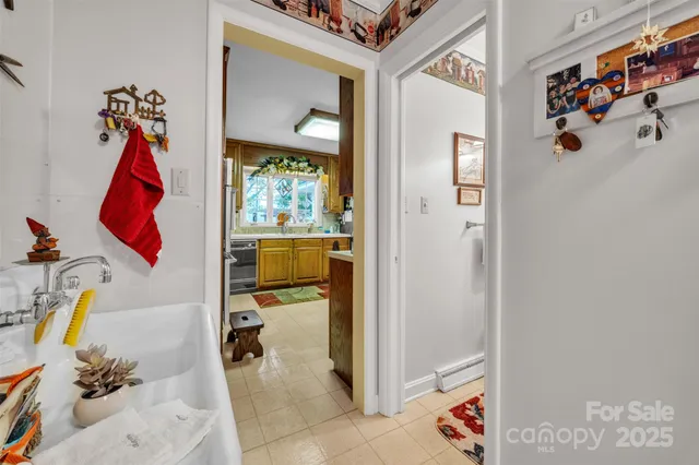 a view of kids room with toys and a window
