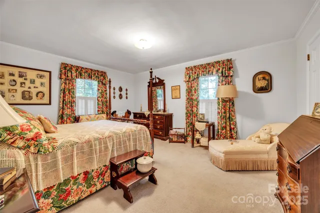 a bed room with a bed and a couch