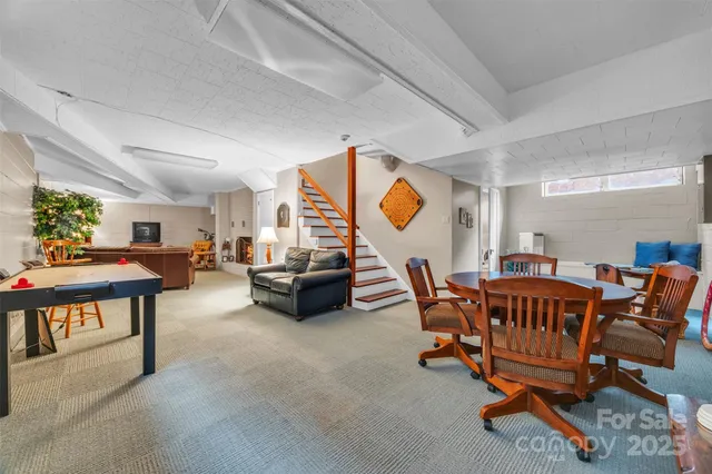 a living room with furniture and a table