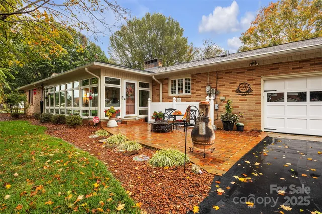 a view of a yard with patio