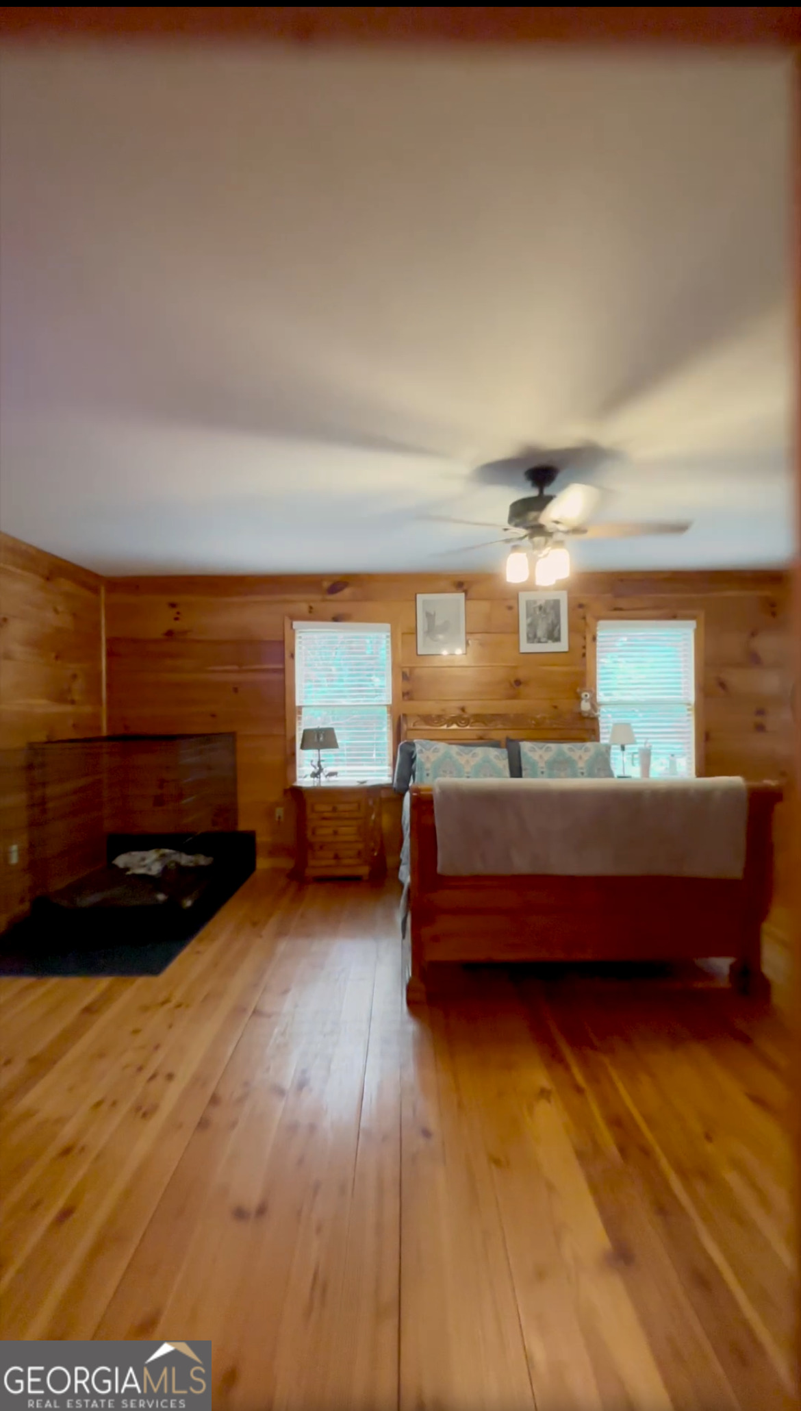 1307 Creasy Patch Road Cornelia, GA 30531 - Photo 12 of 36 a room with furniture and a wooden floor