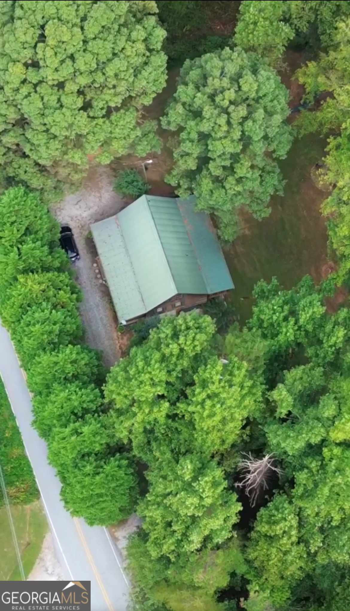 1307 Creasy Patch Road Cornelia, GA 30531 - Photo 2 of 36 an aerial view of a house with a yard