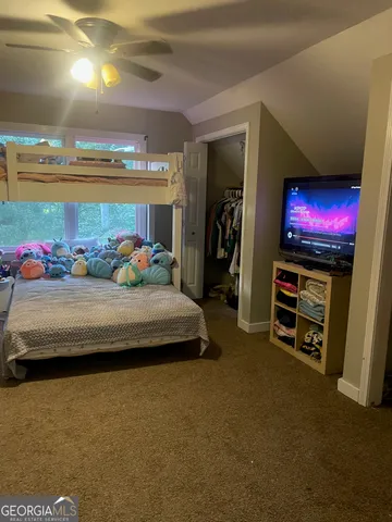 a utility room with furniture and a couch