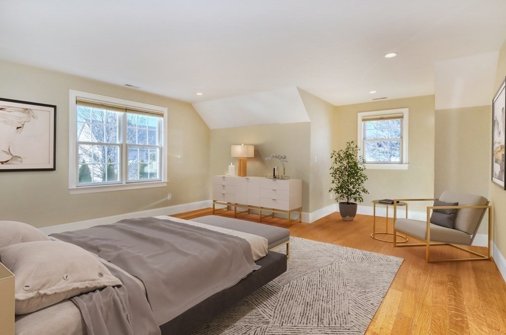 2 A Colonial Drive Arlington, MA 02474 - Photo 16 of 41 a bedroom with a bed and wooden floor