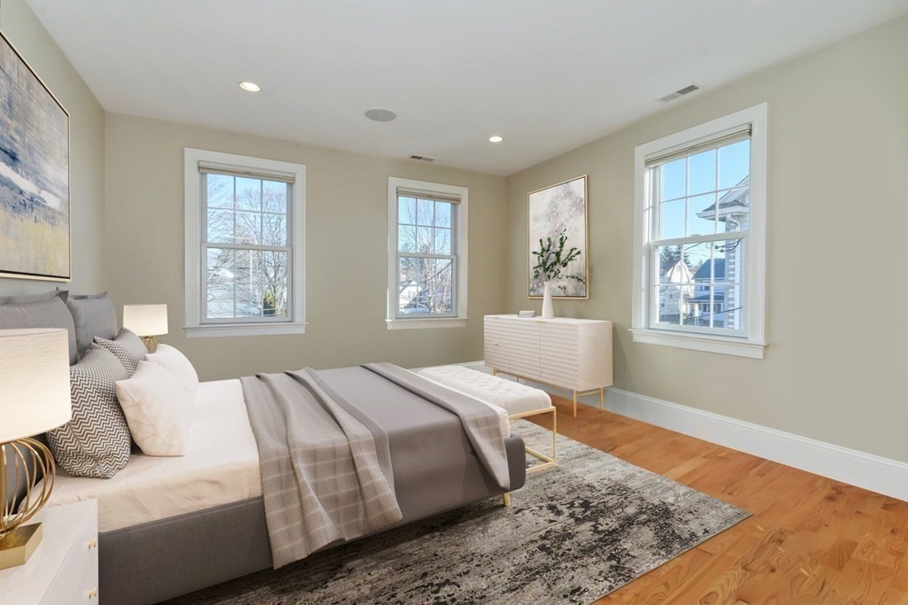 2 A Colonial Drive Arlington, MA 02474 - Photo 19 of 41 a bedroom with a large bed and a window