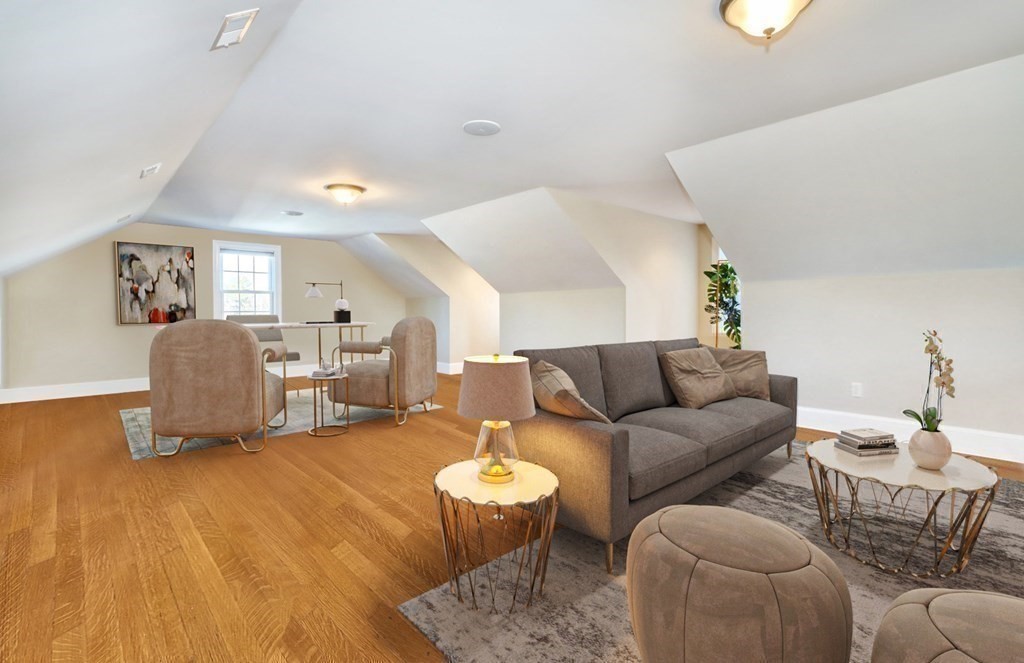 2 A Colonial Drive Arlington, MA 02474 - Photo 26 of 41 a living room with furniture and a table