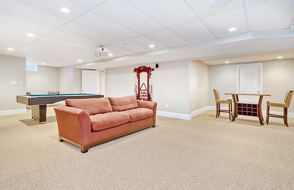 2 A Colonial Drive Arlington, MA 02474 - Photo 29 of 41 a living room with furniture and a flat screen tv