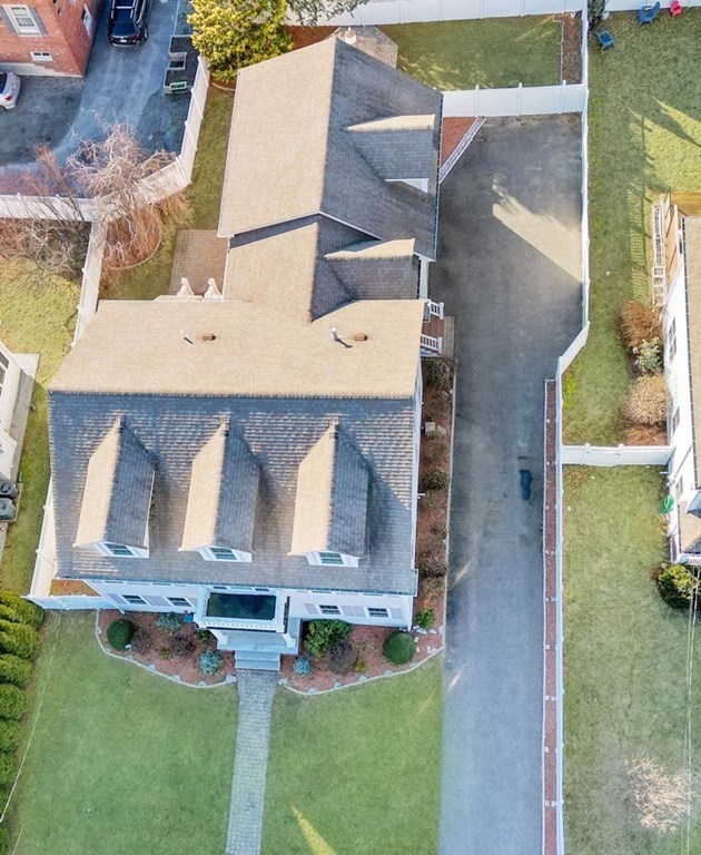 2 A Colonial Drive Arlington, MA 02474 - Photo 39 of 41 an aerial view of a house with garden space and a fountain