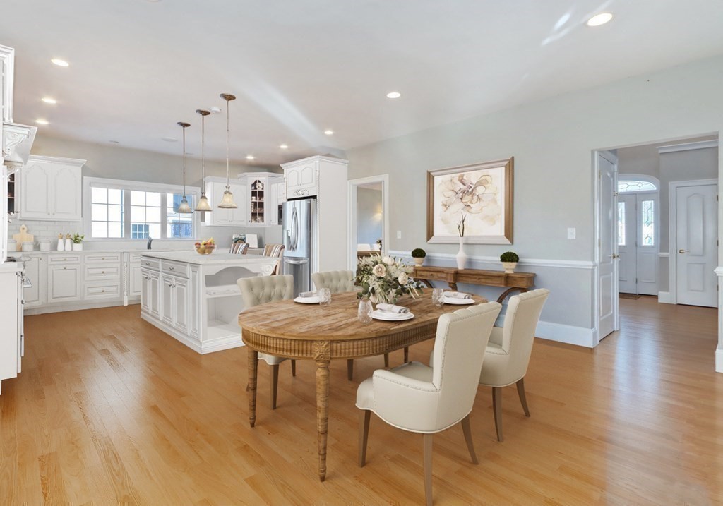 2 A Colonial Drive Arlington, MA 02474 - Photo 6 of 41 a view of a dining room with furniture and wooden floor