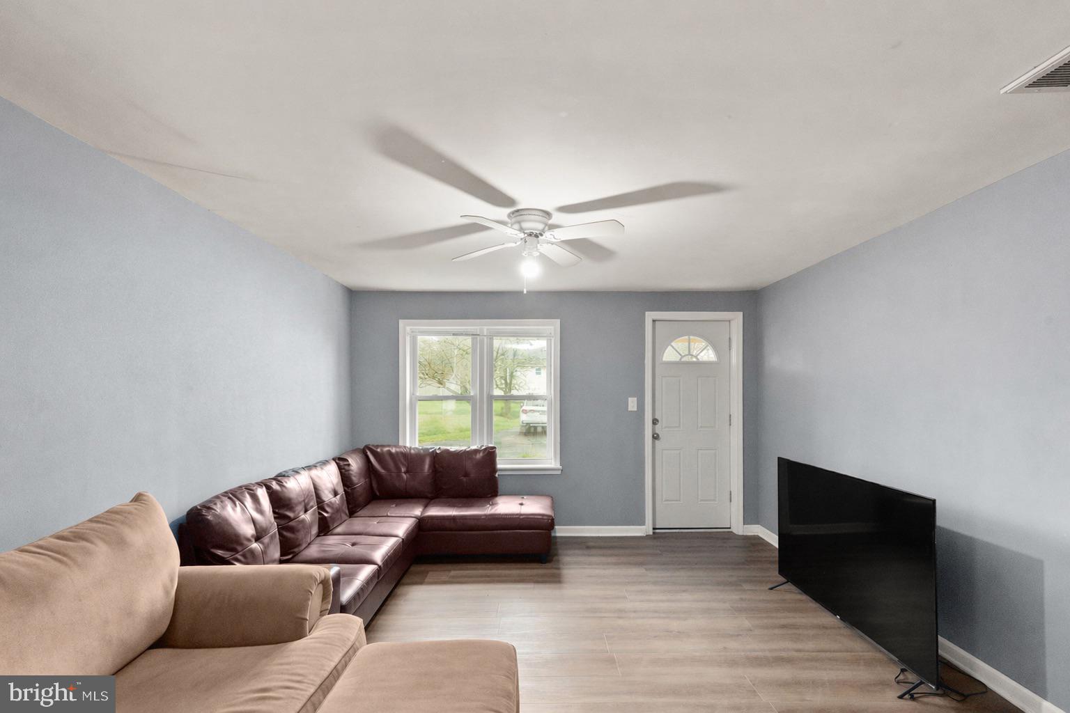 4121 Conowingo Road Darlington, MD 21034 - Photo 12 of 24 a living room with furniture and a ceiling fan