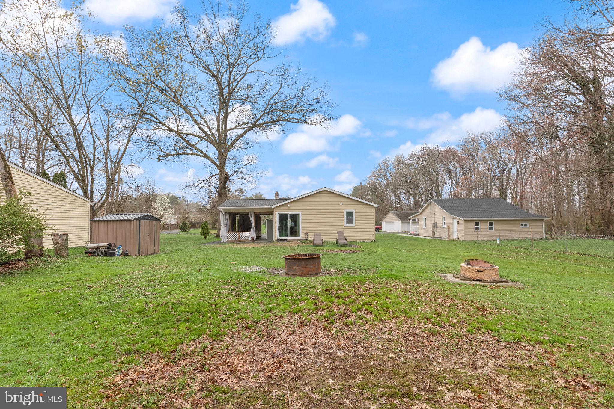 4121 Conowingo Road Darlington, MD 21034 - Photo 4 of 24 a front view of a house with a yard and large tree