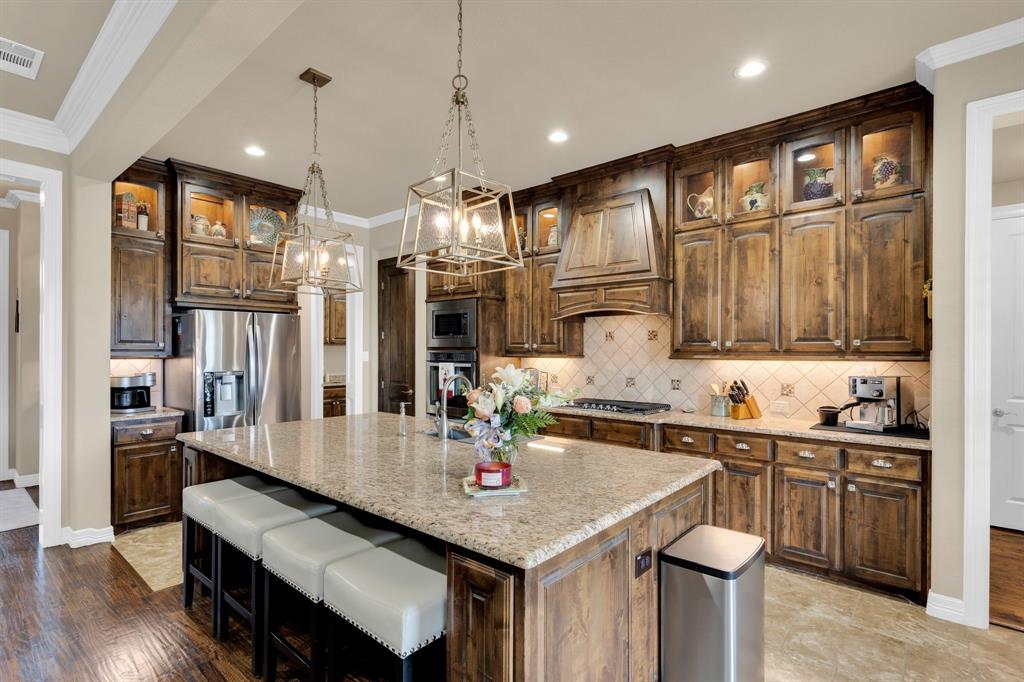 5631 Limestone Lane Midlothian, TX 76065 - Photo 14 of 40 a kitchen with counter space cabinets and appliances