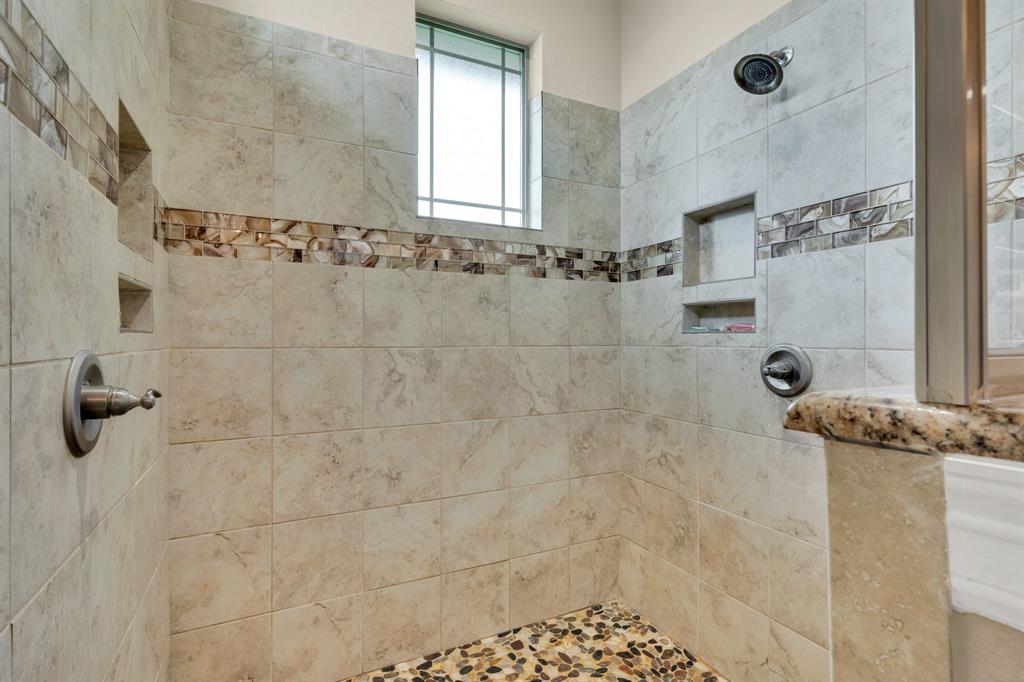 5631 Limestone Lane Midlothian, TX 76065 - Photo 22 of 40 a bathroom with a shower