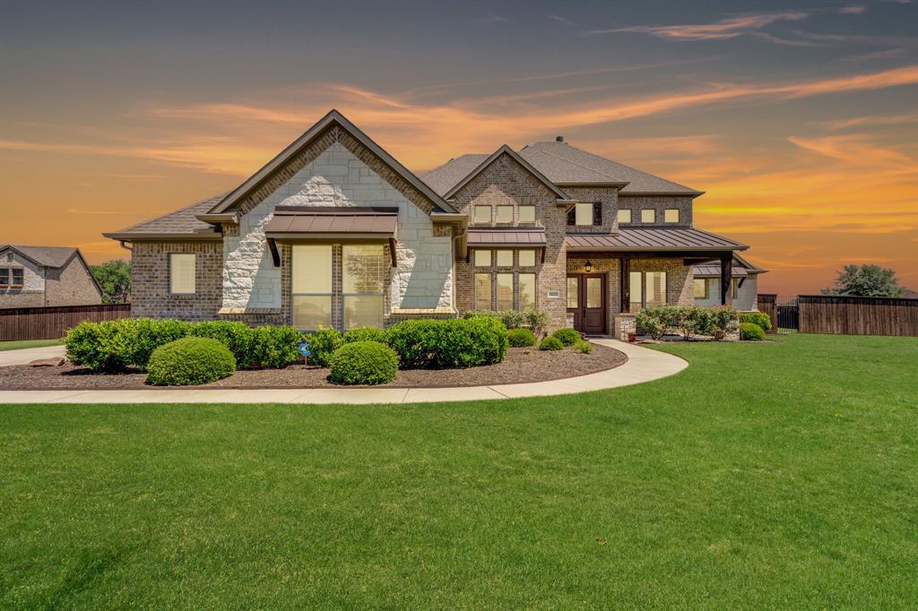 5631 Limestone Lane Midlothian, TX 76065 - Photo 40 of 40 a front view of a house with a yard