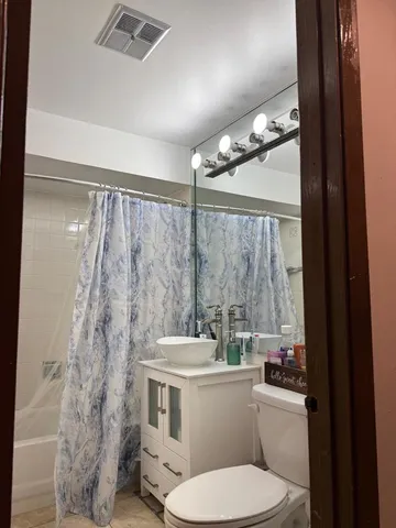 a bath tub sitting next to a bathroom