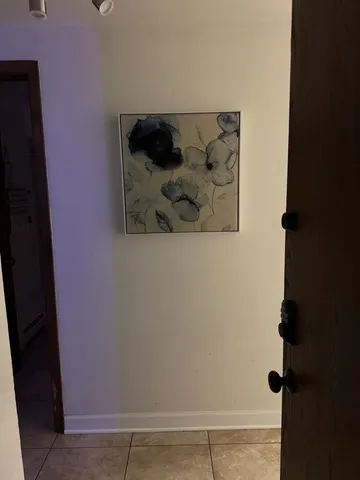 a view of staircase with white walls