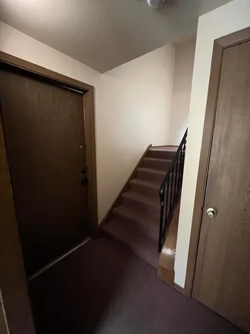 a view of pool with a yard