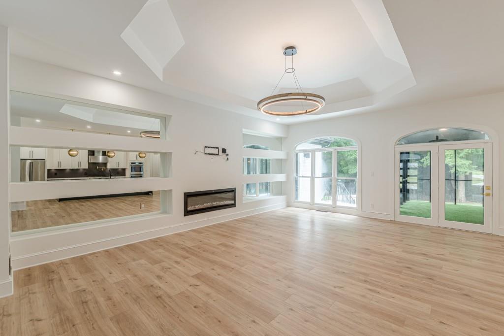 6394 Wood Valley Road Douglasville, GA 30134 - Photo 11 of 84 a view of an empty room with window and cabinet