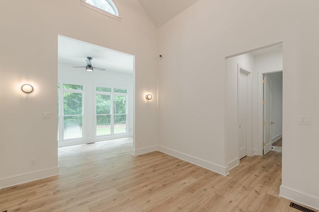 6394 Wood Valley Road Douglasville, GA 30134 - Photo 23 of 84 wooden floor in an empty room