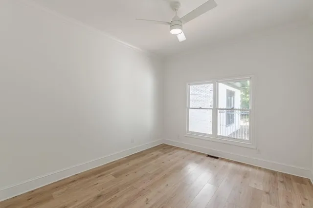 a bathroom with a sink and a window