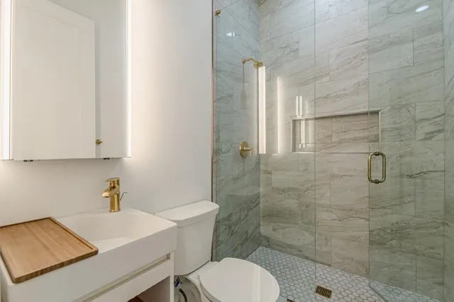 a view of a house with swimming pool and sitting area