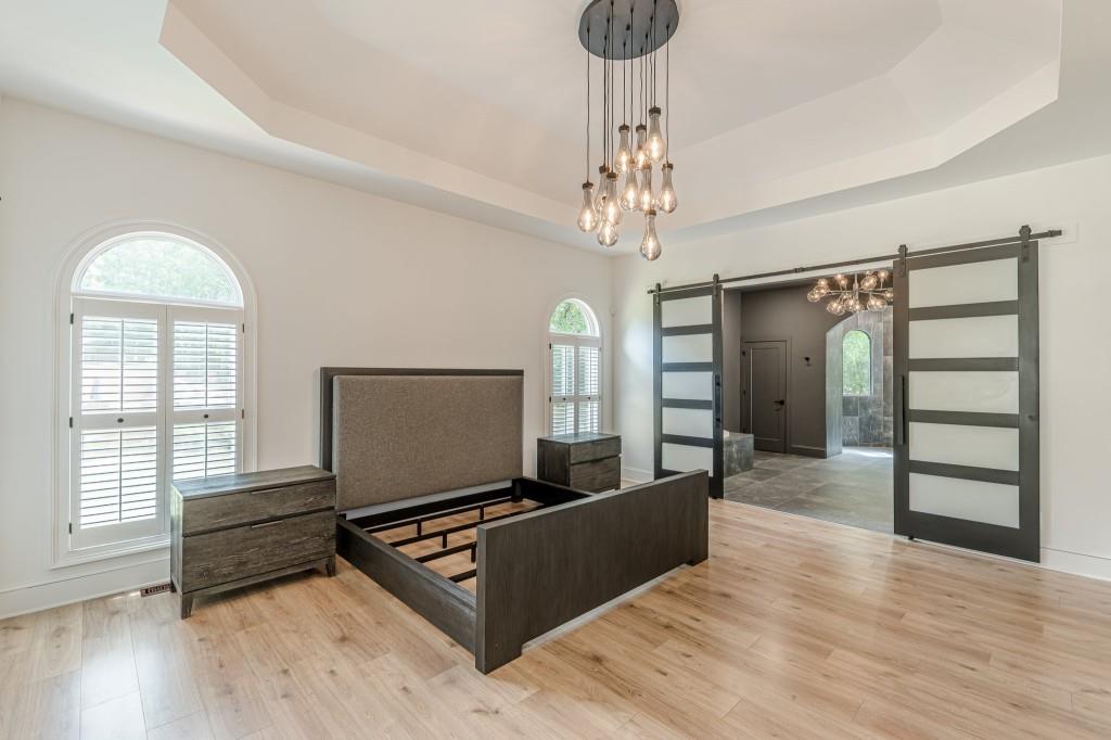 6394 Wood Valley Road Douglasville, GA 30134 - Photo 45 of 84 a living room with furniture and a flat screen tv