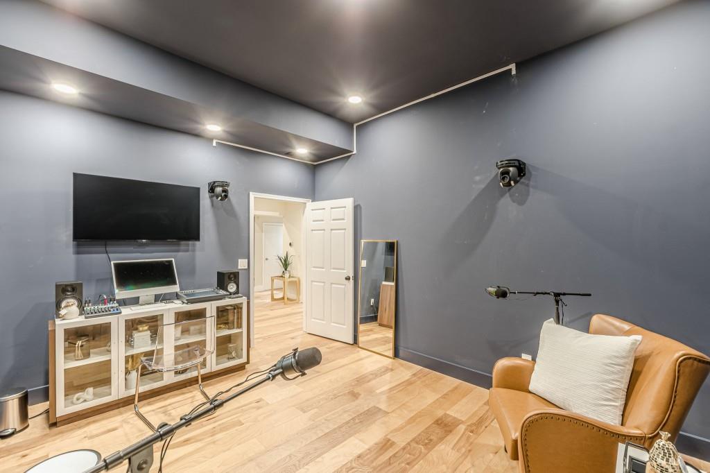 6394 Wood Valley Road Douglasville, GA 30134 - Photo 74 of 84 a bedroom with a bed and a flat screen tv