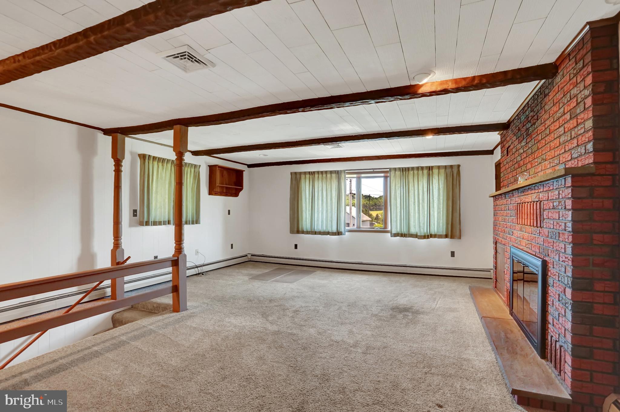 109 Ridgeview Drive Lewistown, PA 17044 - Photo 16 of 40 a view of an empty room with a fireplace
