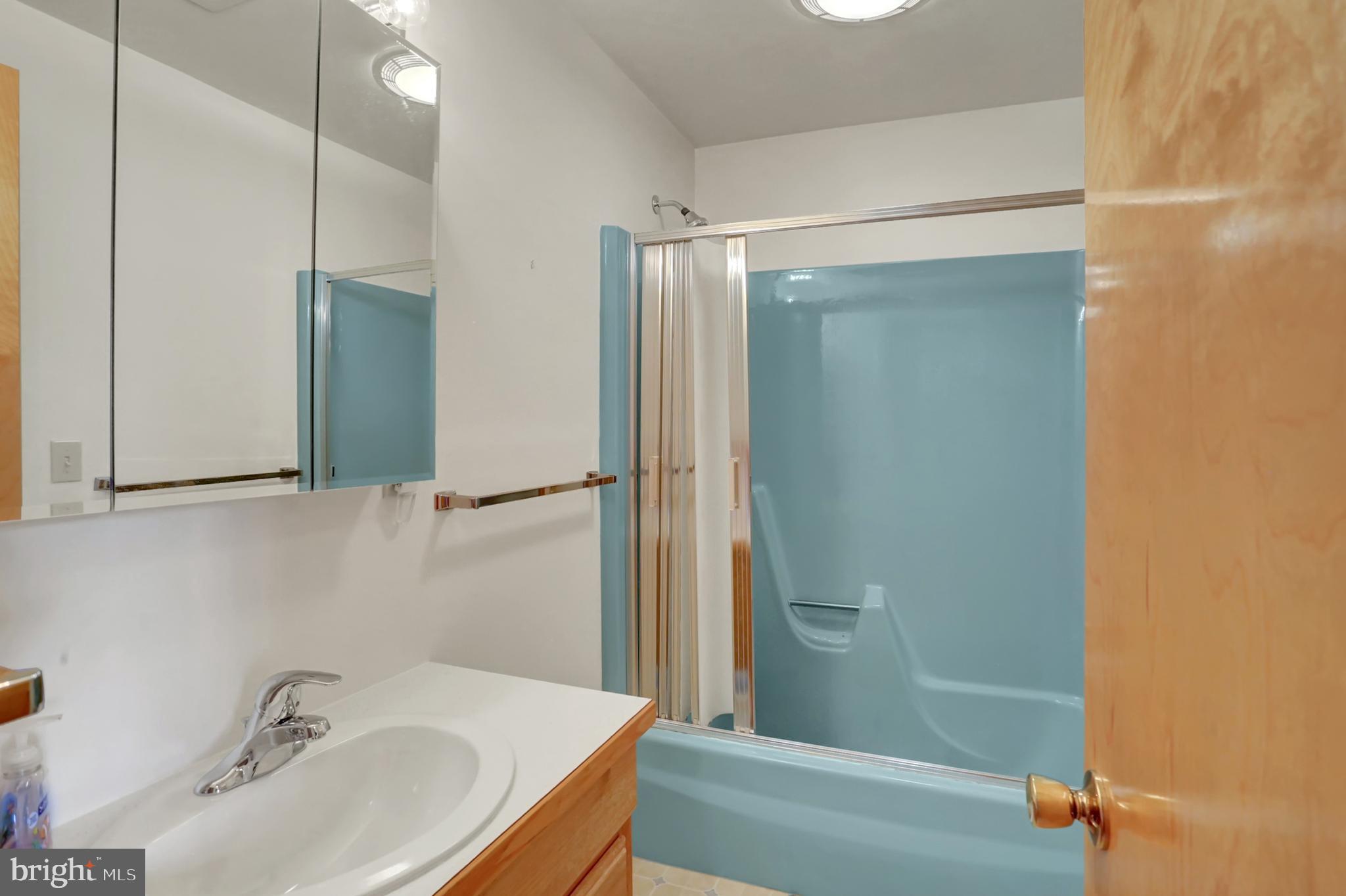 109 Ridgeview Drive Lewistown, PA 17044 - Photo 18 of 40 a bathroom with a sink and shower