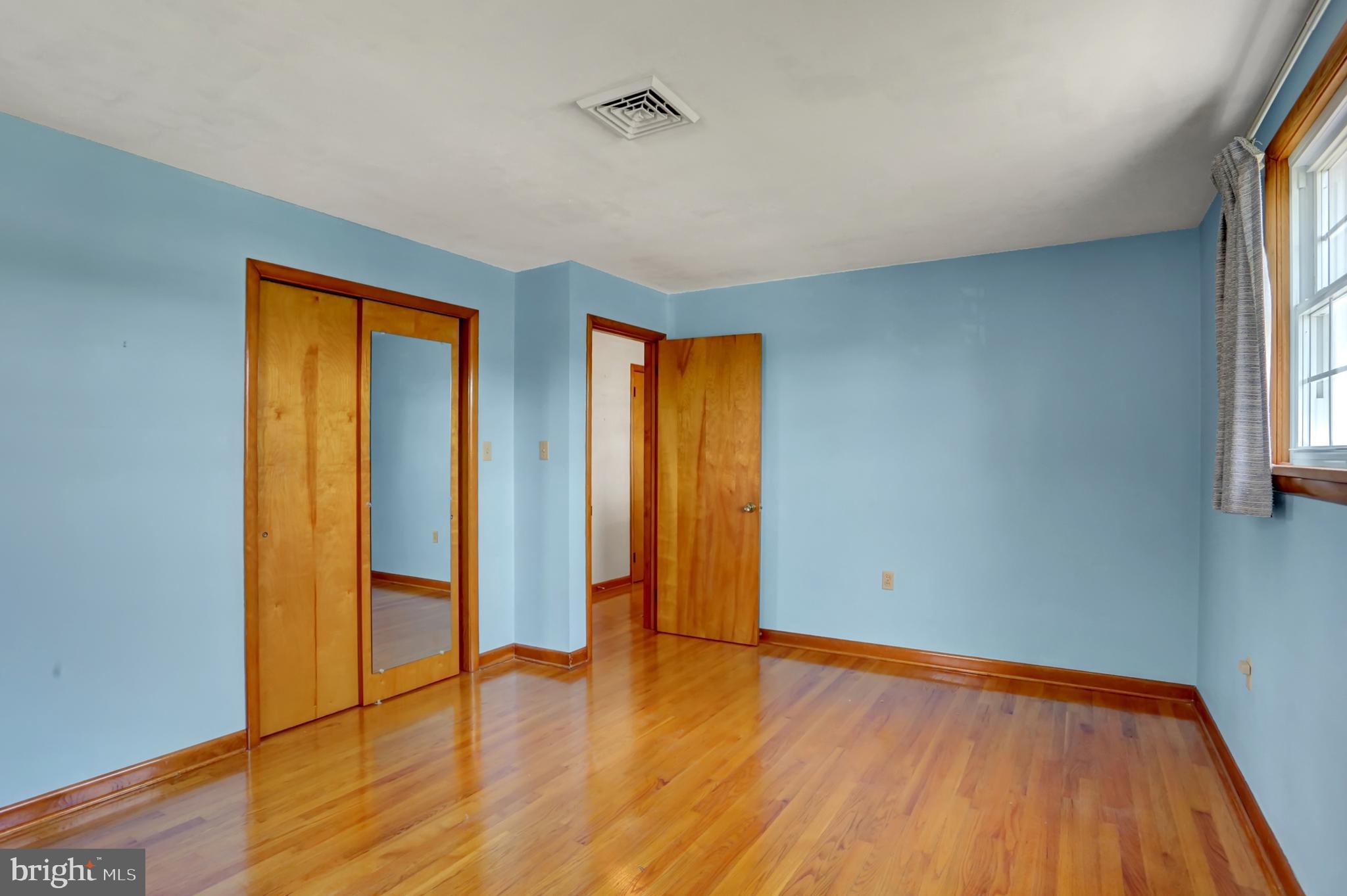 109 Ridgeview Drive Lewistown, PA 17044 - Photo 23 of 40 an empty room with wooden floor and closet
