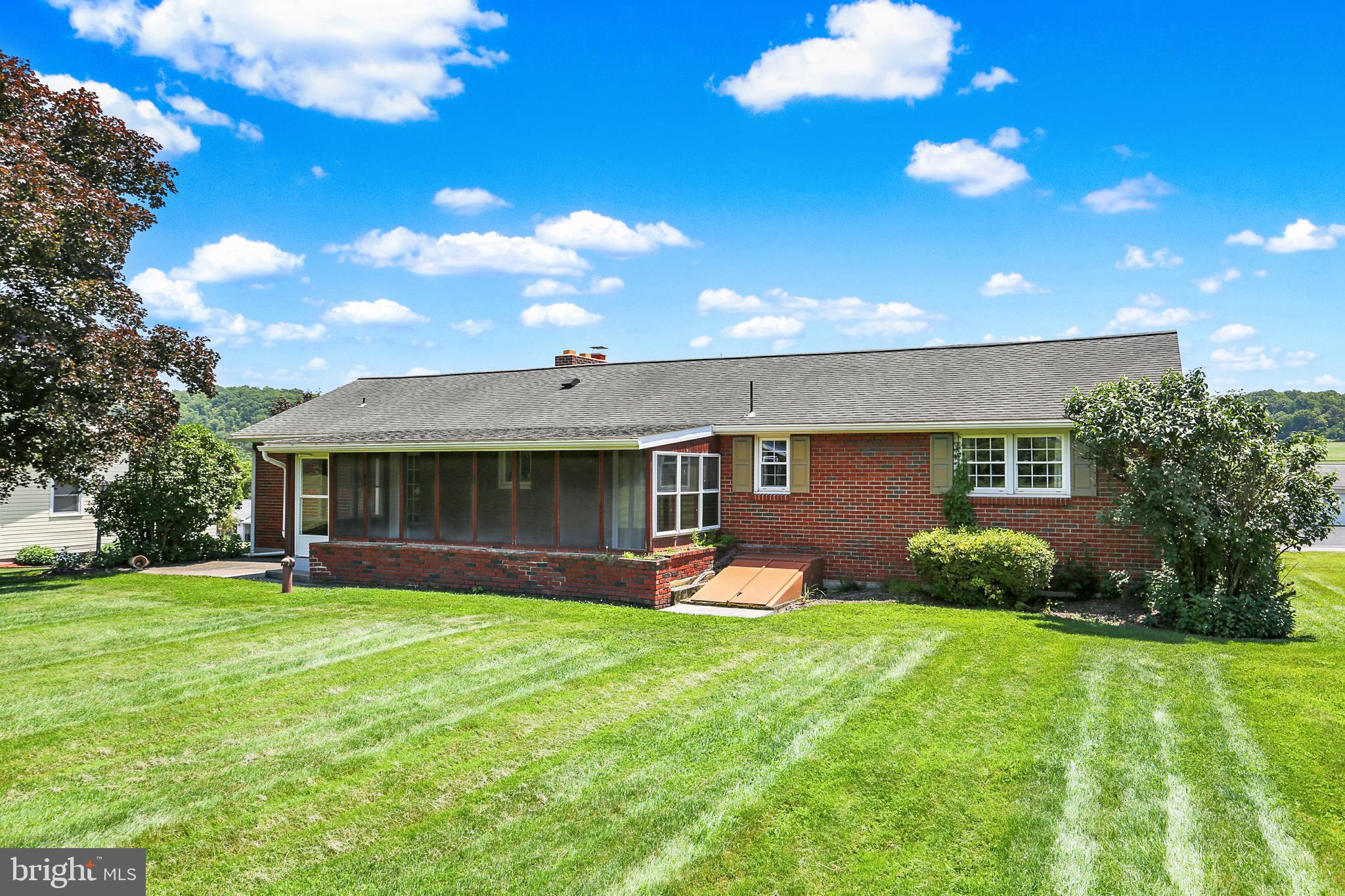 109 Ridgeview Drive Lewistown, PA 17044 - Photo 38 of 40 a front view of a house with garden