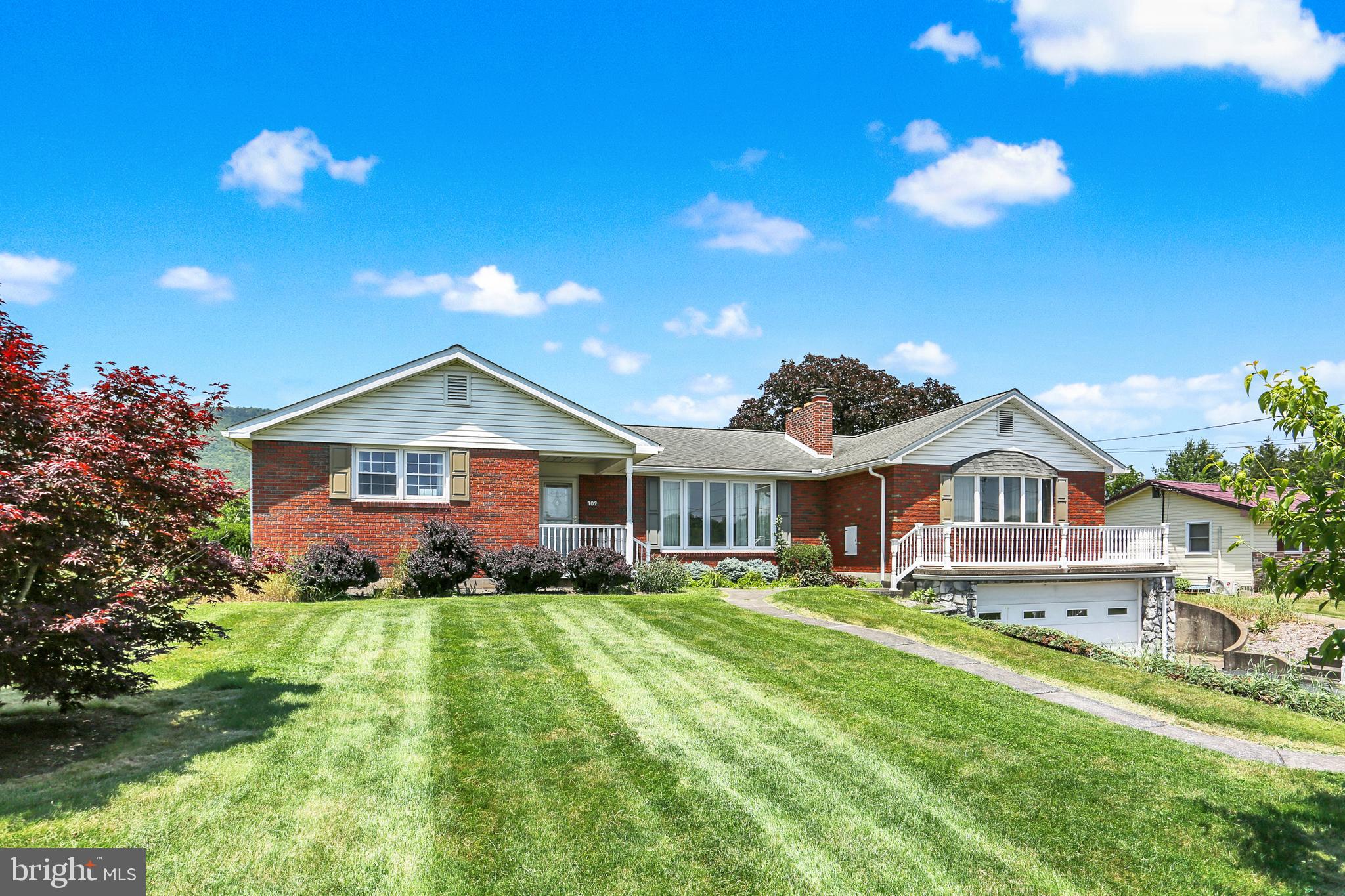 109 Ridgeview Drive Lewistown, PA 17044 - Photo 8 of 40 a front view of a house with a yard