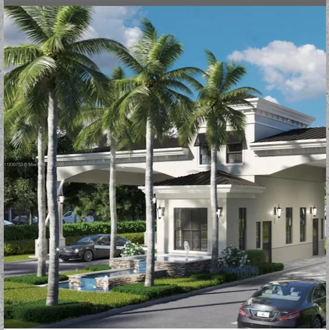 an aerial view of residential houses with outdoor space and river