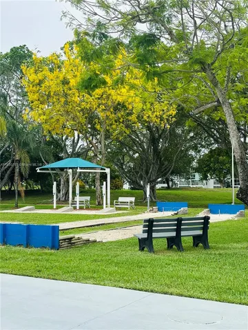 swimming pool view with seating space