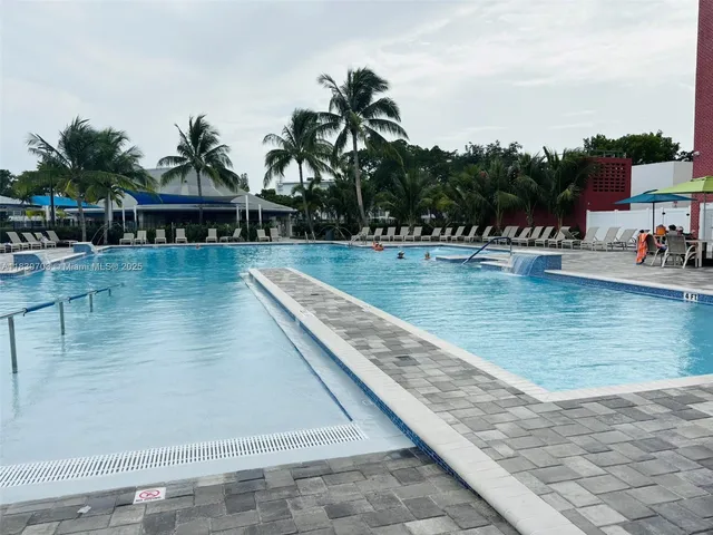 a view of a chairs and tables in the patio