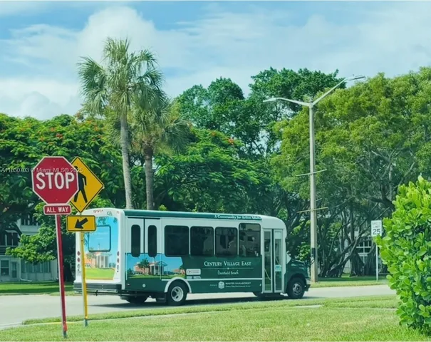 a view of a large building with a big yard