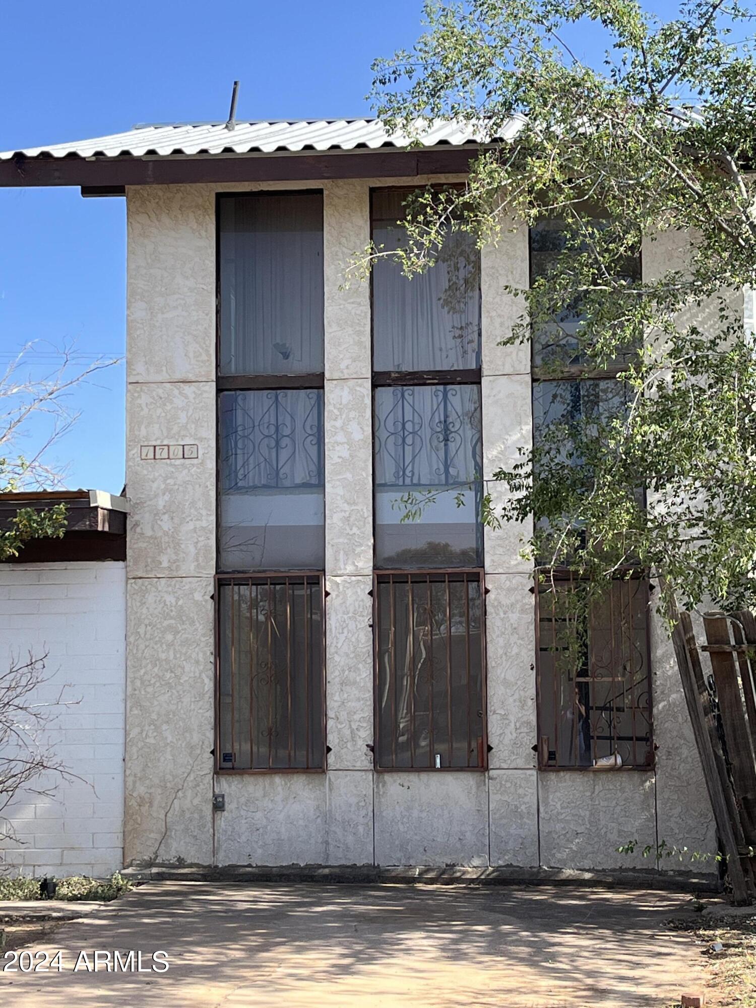 1705 6th Green Street Douglas, AZ 85607 - Photo 1 of 11 a view of a house with street