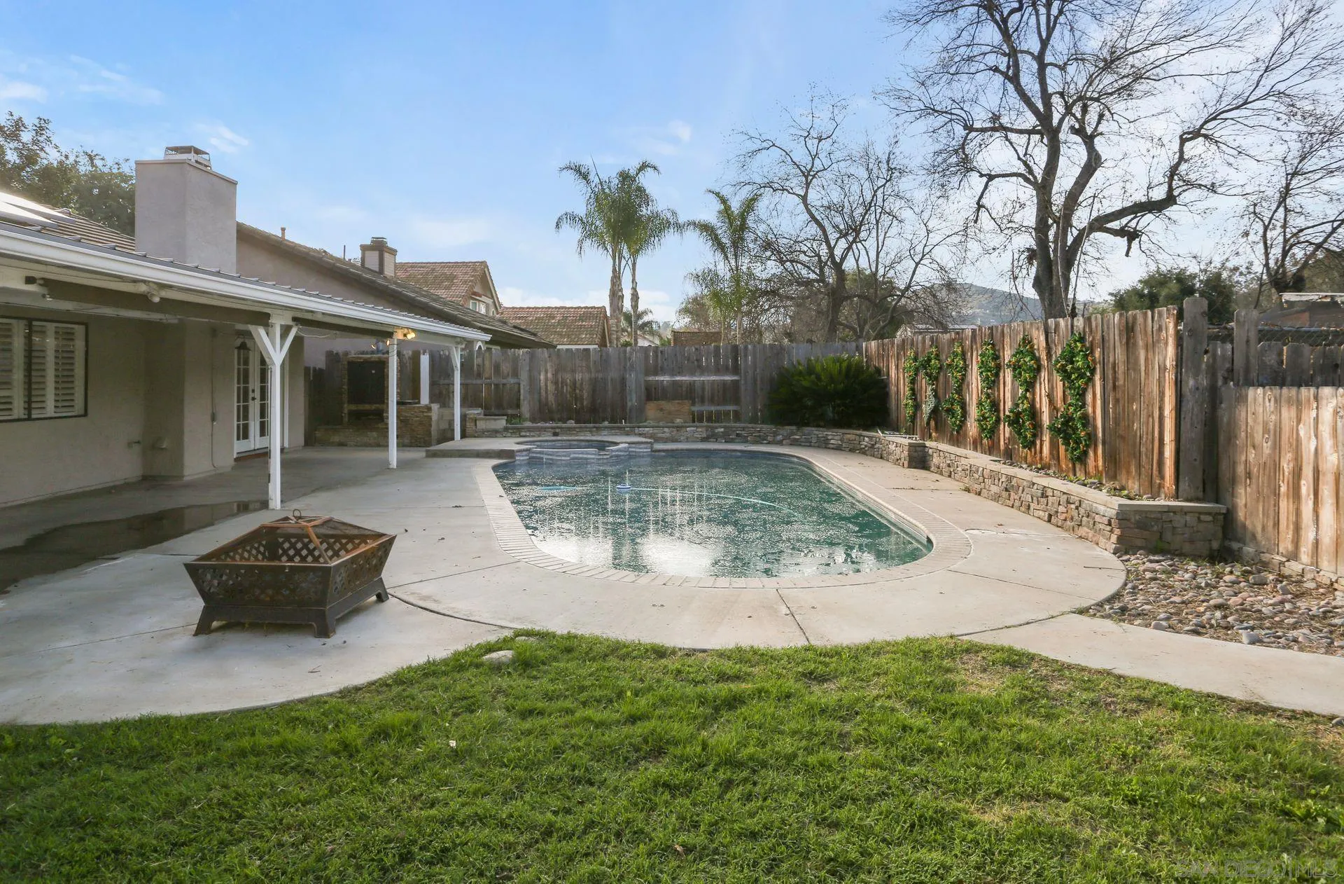 9260 Sombria Road Lakeside, CA 92040 - Photo 27 of 31 a view of a backyard with potted plants and tree