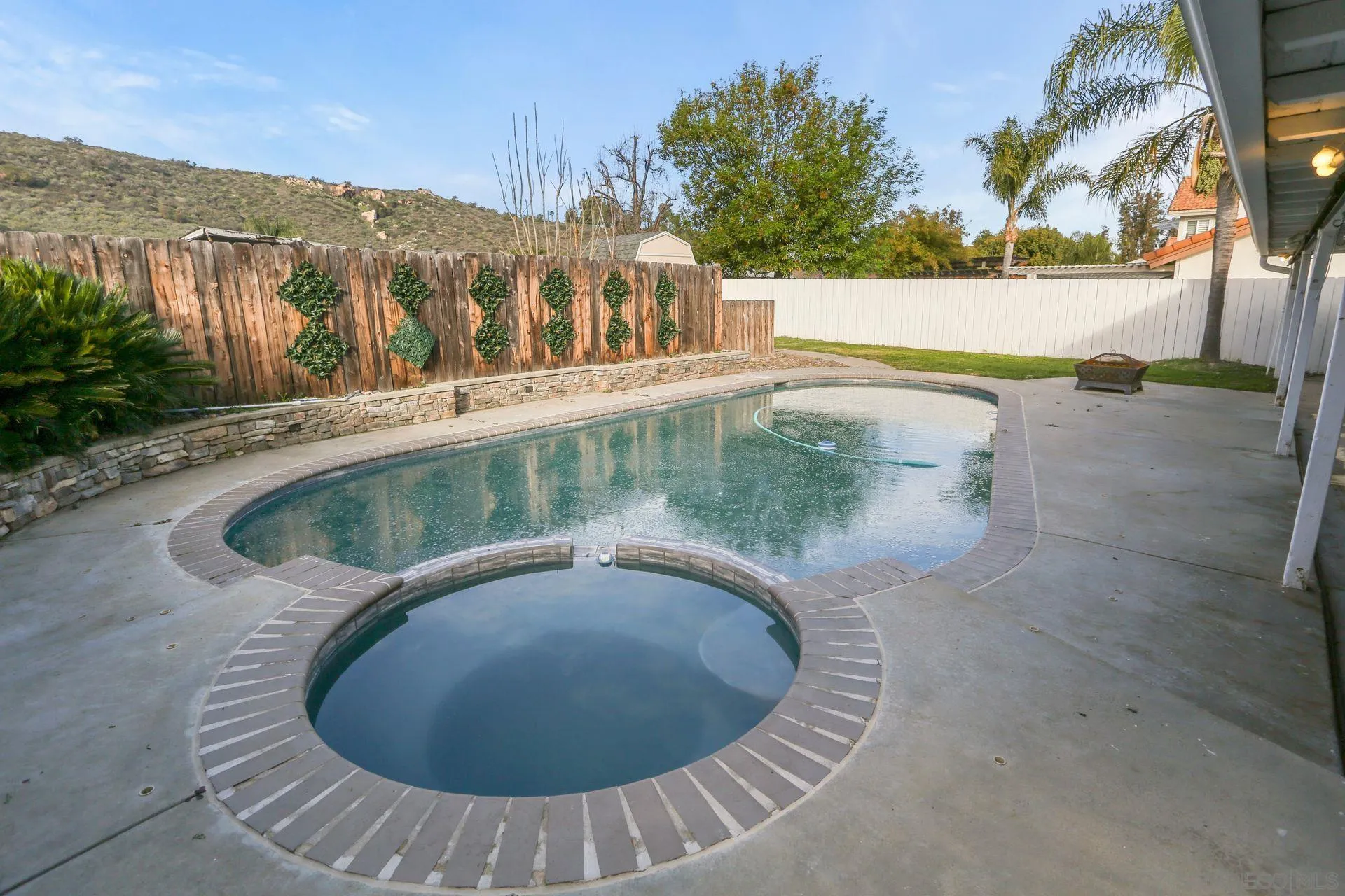 9260 Sombria Road Lakeside, CA 92040 - Photo 30 of 31 a view of a swimming pool with a yard