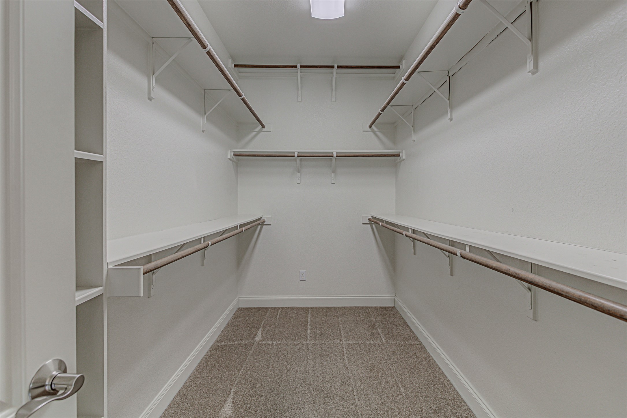 110 Sebastians Run Austin, TX 78738 - Photo 23 of 40 Walk in closet with light colored carpet