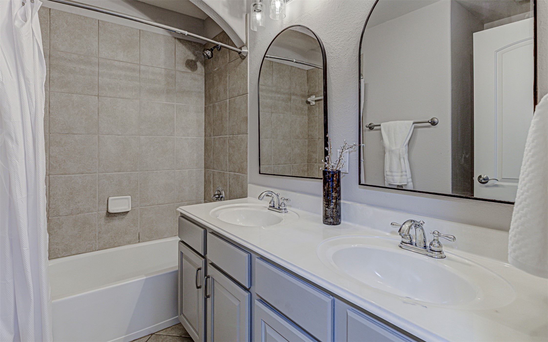 110 Sebastians Run Austin, TX 78738 - Photo 29 of 40 Full bathroom with shower / bath combo and double vanity
