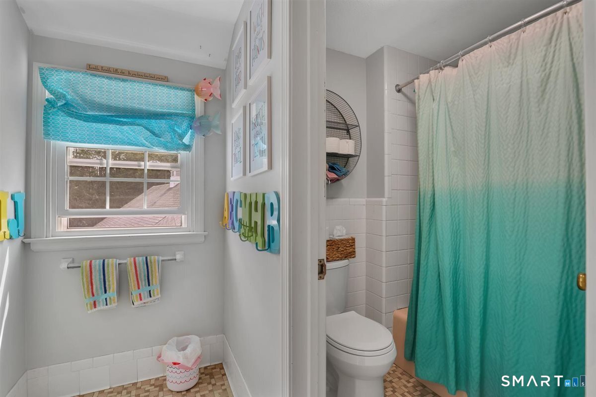 72 Old Post Road Wethersfield, CT 06109 - Photo 28 of 40 a bathroom with a toilet and a shower