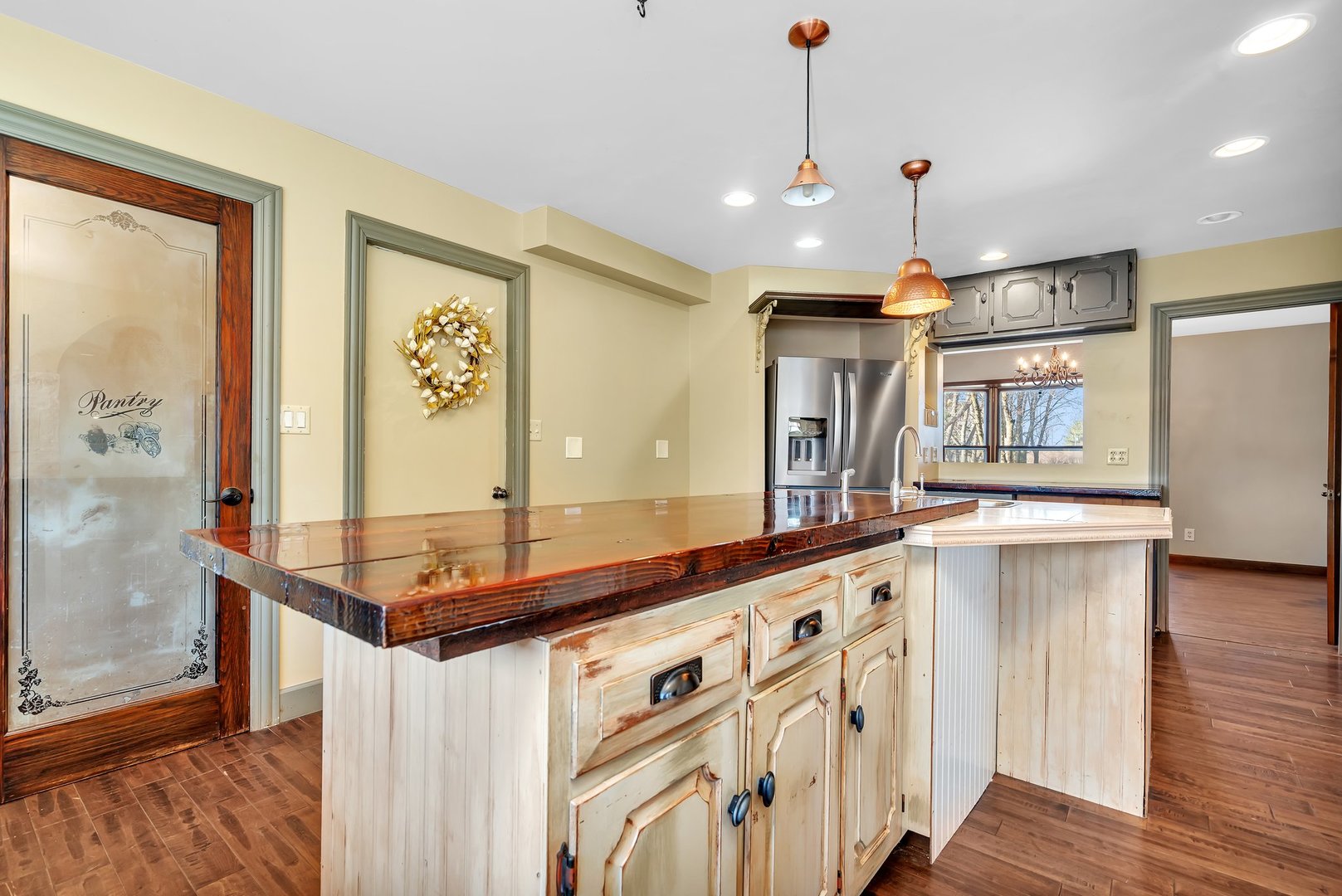 13070 McKanna Road Minooka, IL 60447 - Photo 24 of 43 a kitchen with stainless steel appliances granite countertop a sink and cabinets