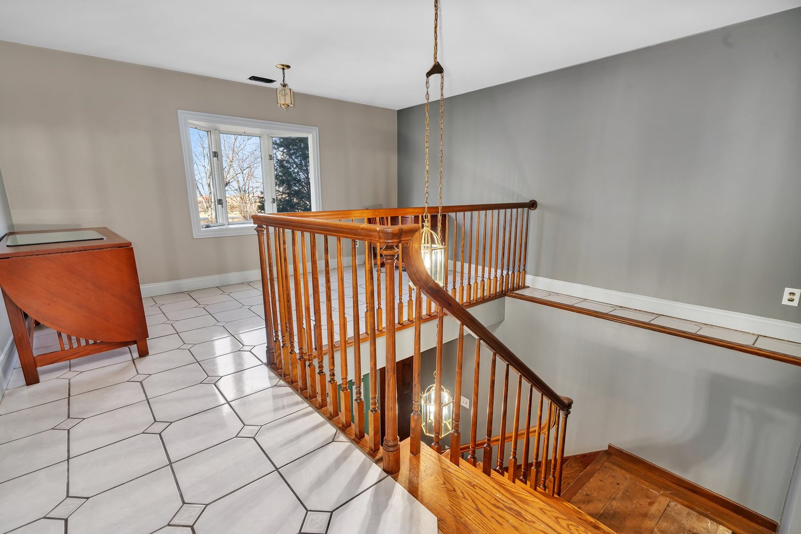 13070 McKanna Road Minooka, IL 60447 - Photo 29 of 43 a view of entryway with stairs and wooden floor