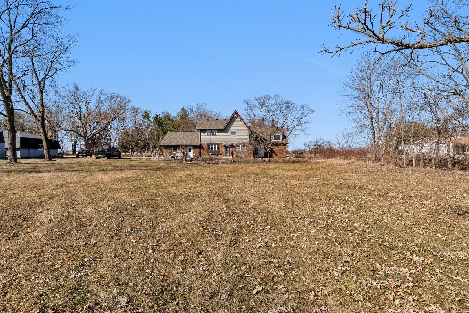 13070 McKanna Road Minooka, IL 60447 - Photo 41 of 43 a view of a field with trees in the background